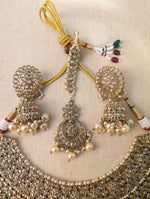 Load image into Gallery viewer, Gold necklace set with chandbali earrings and tikka. Polki choker necklace set. Indian wedding jewelry. Pakistani wedding jewelry. Bollywood necklace set. Punjabi jewelry set. Kundan necklace jhumka. Antique gold-plated necklace. Champagne stones.
