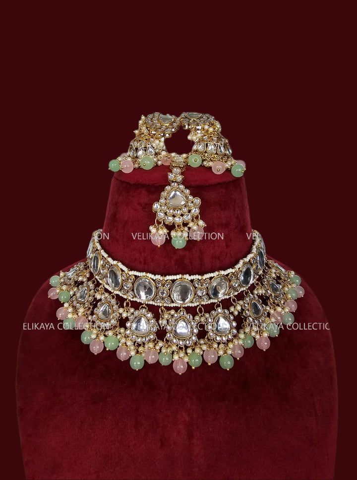 Kundan choker necklace with jhumkas and tikka. Gold plating. Mint beads. Indian wedding jewelry. Pakistani jewelry.