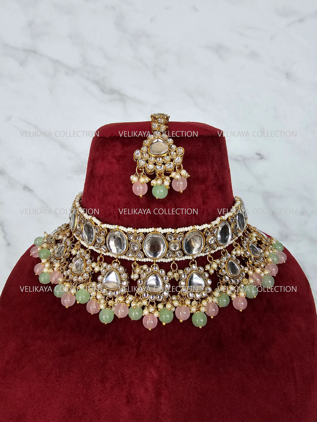 Kundan choker necklace with jhumkas and tikka. Gold plating. Mint beads. Indian wedding jewelry. Pakistani jewelry.