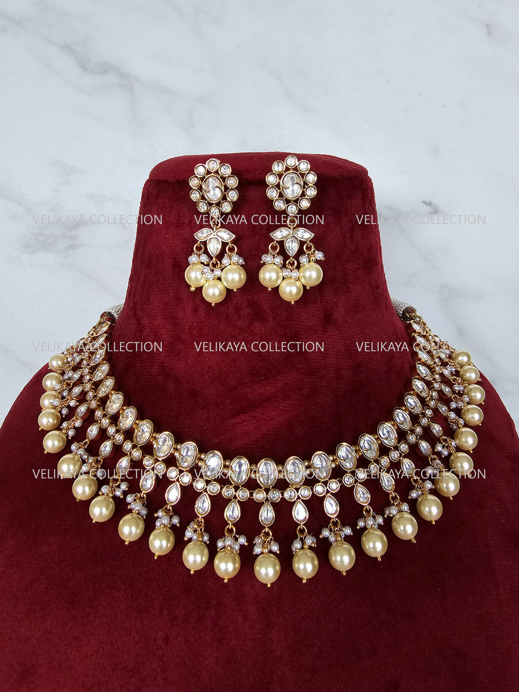 Premium gold plated Kundan choker necklace & earrings. Indian wedding jewelry. Pakistani jewelry.