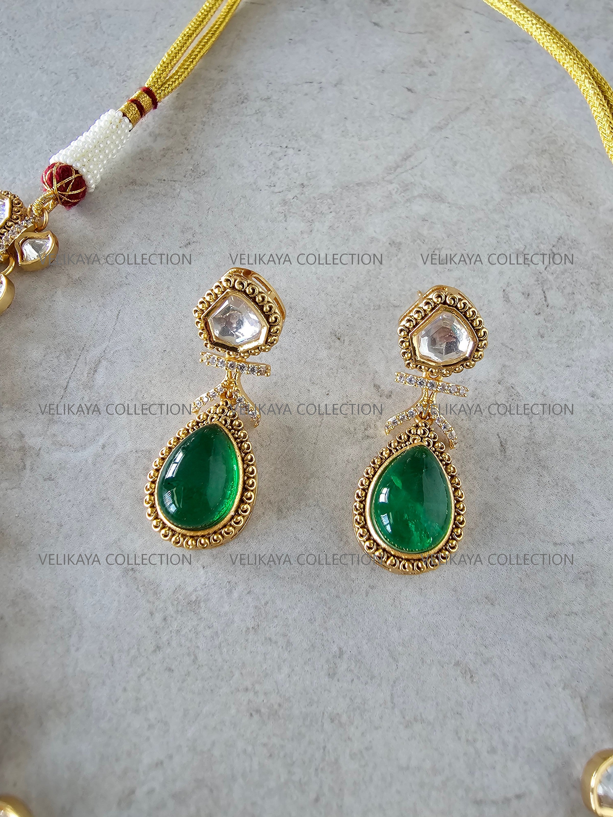 Sani Emerald Green Kundan Necklace Set