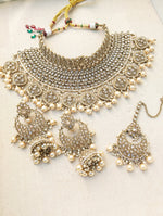 Load image into Gallery viewer, Gold necklace set with chandbali earrings and tikka. Polki choker necklace set. Indian wedding jewelry. Pakistani wedding jewelry. Bollywood necklace set. Punjabi jewelry set. Kundan necklace jhumka. Antique gold-plated necklace. Champagne stones.
