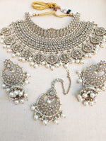 Load image into Gallery viewer, Antique Gold necklace set with chandbali earrings and tikka. Polki choker necklace set. Indian wedding jewelry. Pakistani wedding jewelry. Bollywood necklace set. Punjabi jewelry set. Kundan necklace jhumka. Antique gold-plated necklace. Champagne stones.
