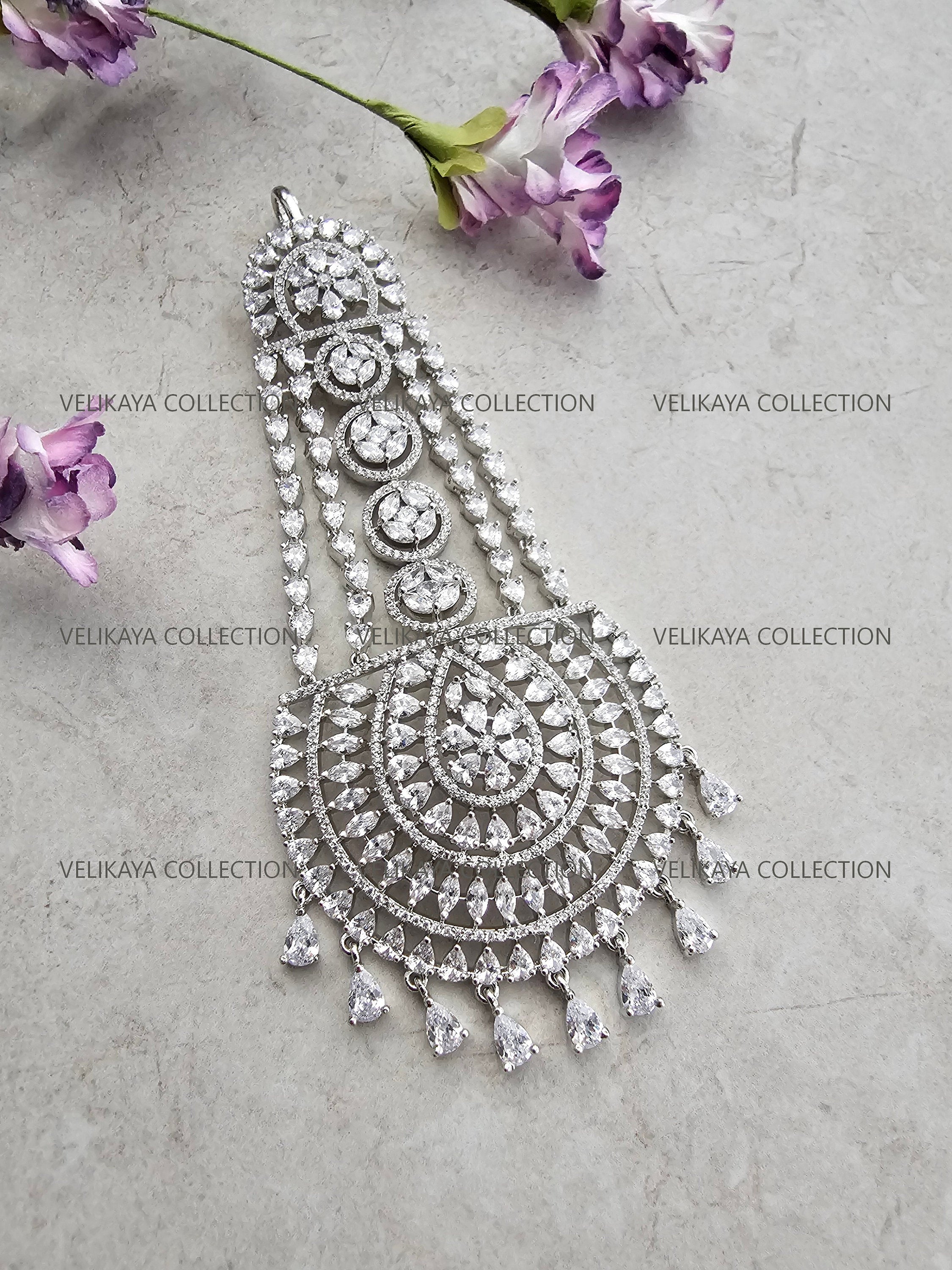 American diamond tikka. CZ pasa. Indian hair jewelry. Pakistani hair jewelry. Diamond hair accessory. Diamond hair jewelry. Silver tikka. Silver pasa. American Diamond Jhumar. Gold hair accessory. Indian wedding jewelry. Pakistani wedding jewelry. The best Indian and Pakistani online jewelry store near you