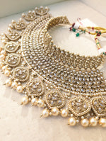 Load image into Gallery viewer, Gold necklace set with chandbali earrings and tikka. Polki choker necklace set. Indian wedding jewelry. Pakistani wedding jewelry. Bollywood necklace set. Punjabi jewelry set. Kundan necklace jhumka. Antique gold-plated necklace. Champagne stones.
