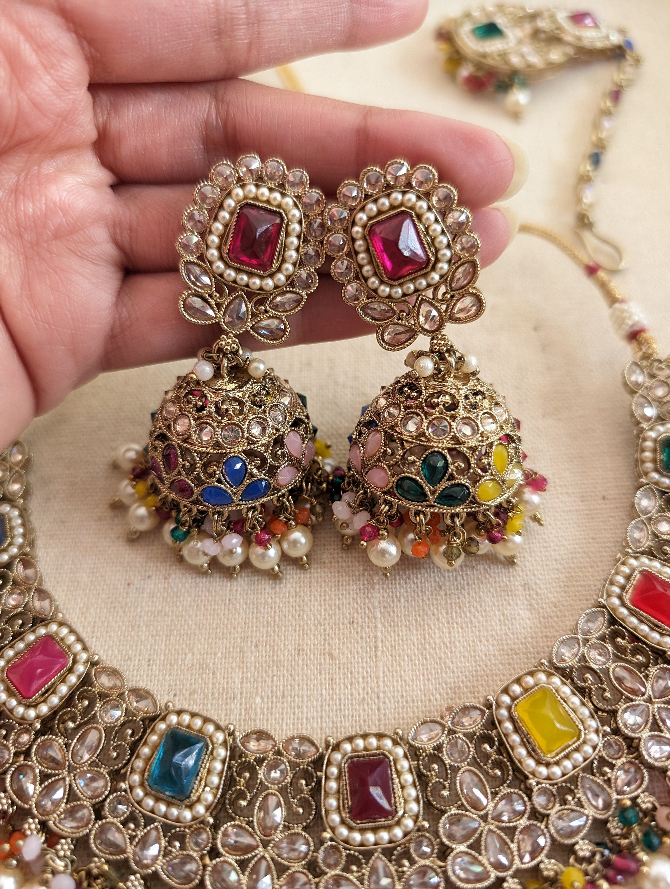 Gold necklace set with chandbali earrings and tikka. Polki choker necklace set. Indian wedding jewelry. Pakistani wedding jewelry. Bollywood necklace set. Punjabi jewelry set. Kundan necklace jhumka. Antique gold-plated necklace. Champagne stones.