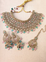 Load image into Gallery viewer, Antique Gold necklace set with chandbali earrings and tikka. Polki choker necklace set. Indian wedding jewelry. Pakistani wedding jewelry. Bollywood necklace set. Punjabi jewelry set. Kundan necklace jhumka. Antique gold-plated necklace. Champagne stones.
