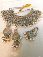 Load image into Gallery viewer, Gold necklace set with chandbali earrings and tikka. Polki choker necklace set. Indian wedding jewelry. Pakistani wedding jewelry. Bollywood necklace set. Punjabi jewelry set. Kundan necklace jhumka. Antique gold-plated necklace. Champagne stones.
