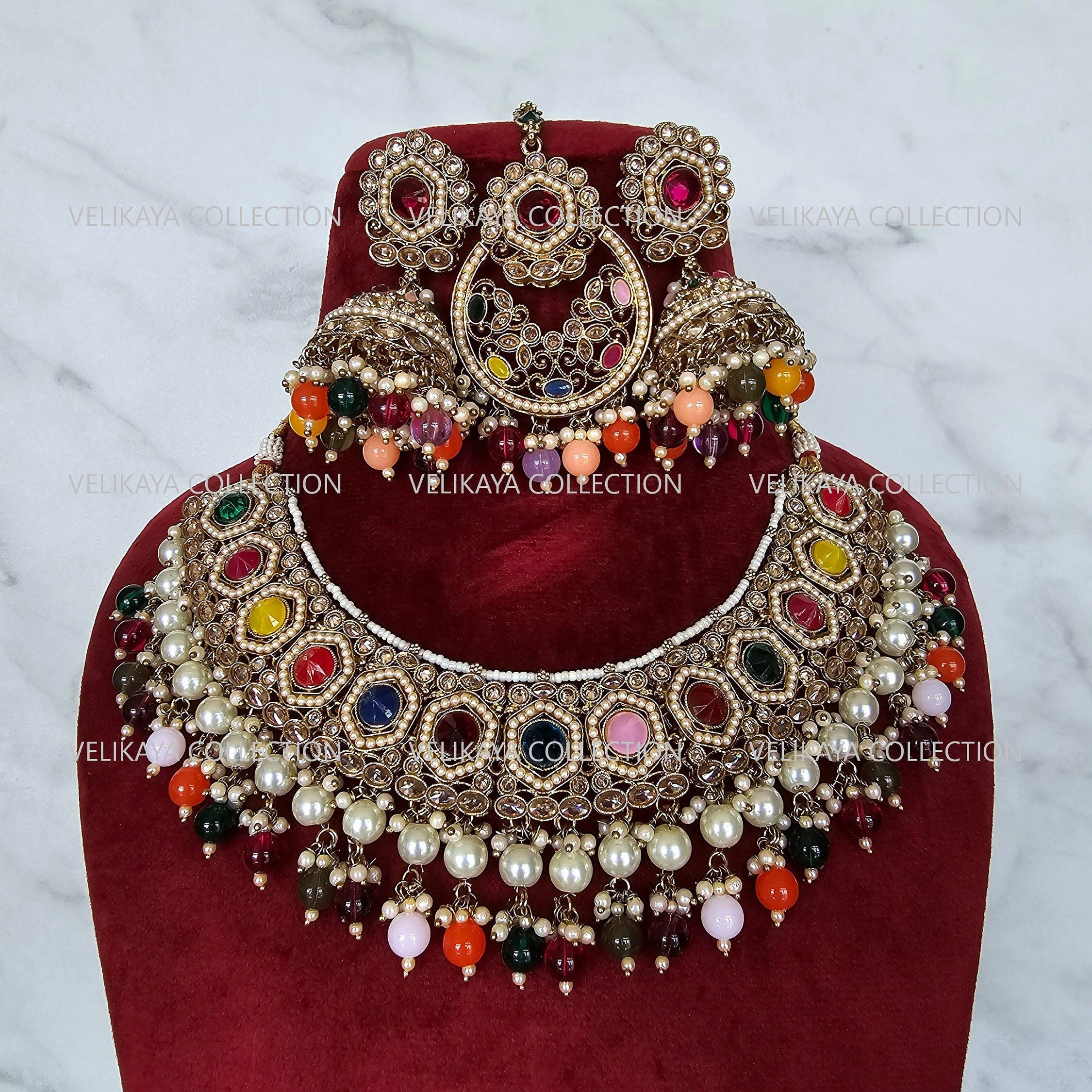 Gold necklace set with chandbali earrings and tikka. Polki choker necklace set. Indian wedding jewelry. Pakistani wedding jewelry. Bollywood necklace set. Punjabi jewelry set. Kundan necklace jhumka. Antique gold-plated necklace. Champagne stones.