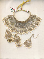 Load image into Gallery viewer, Gold necklace set with chandbali earrings and tikka. Polki choker necklace set. Indian wedding jewelry. Pakistani wedding jewelry. Bollywood necklace set. Punjabi jewelry set. Kundan necklace jhumka. Antique gold-plated necklace. Champagne stones.
