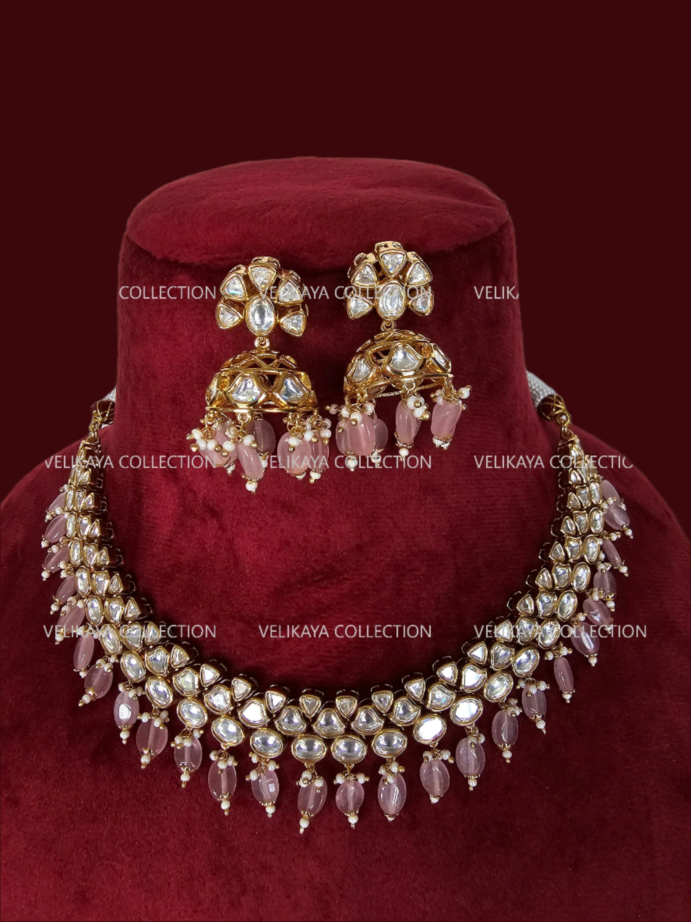 Premium gold plated kundan necklace with jhumka earrings for Indian wedding jewellery and Pakistani weddings.