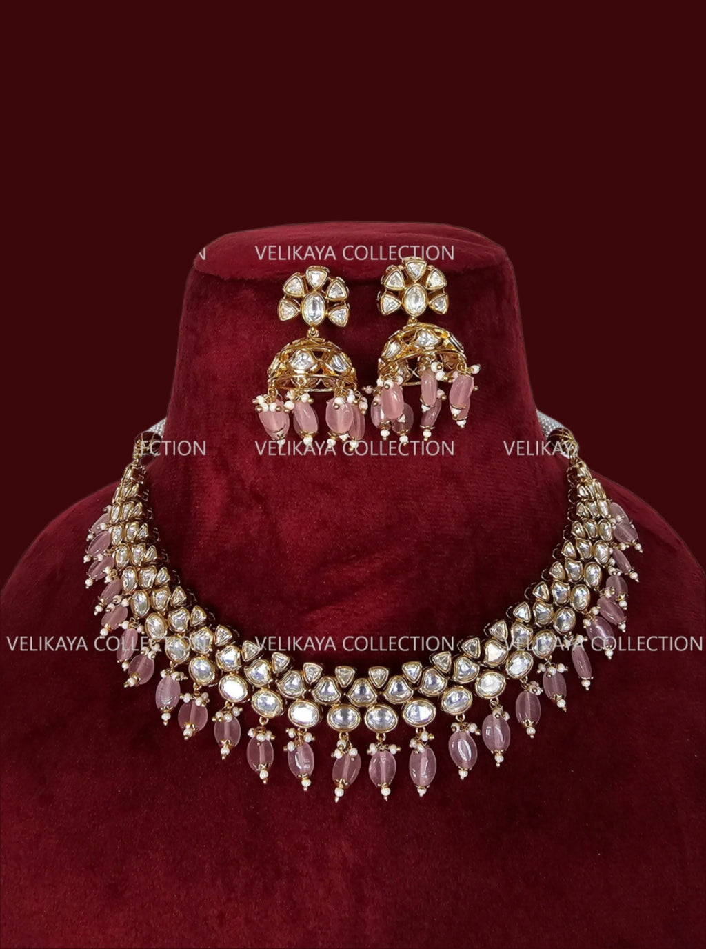 Premium gold plated kundan necklace with jhumka earrings for Indian wedding jewellery and Pakistani weddings.