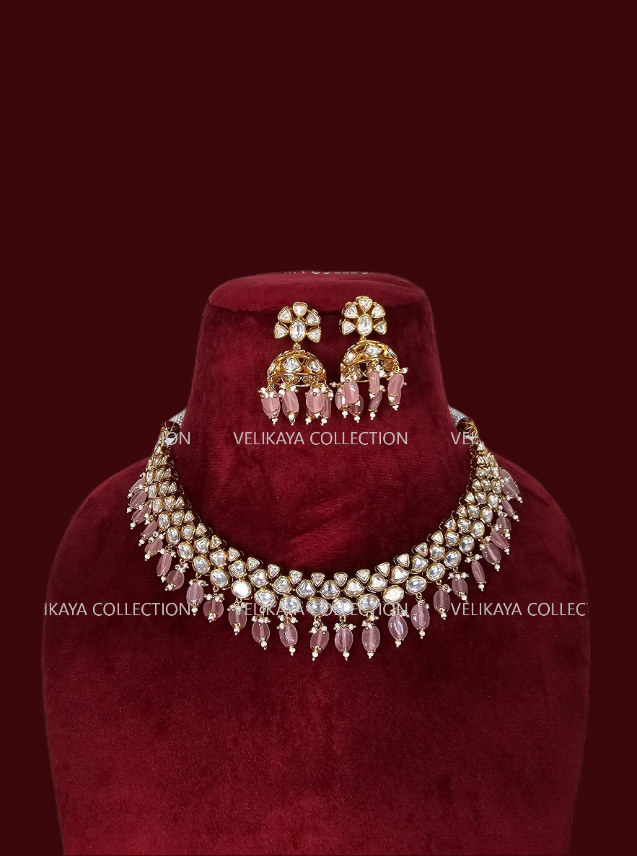 Premium gold plated kundan necklace with jhumka earrings for Indian wedding jewellery and Pakistani weddings.