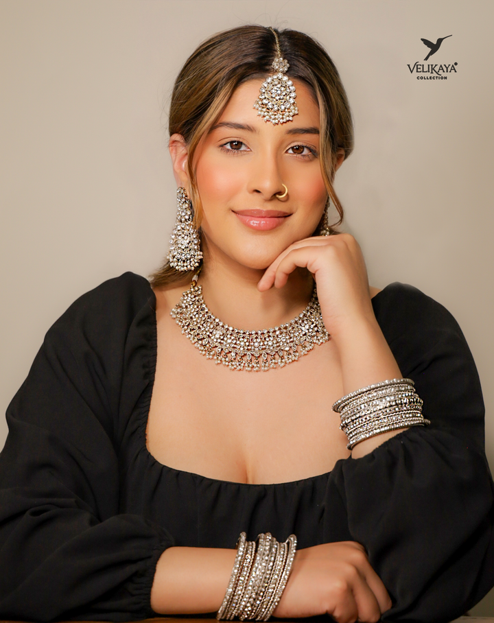 Woman wearing traditional Indian jewelry 