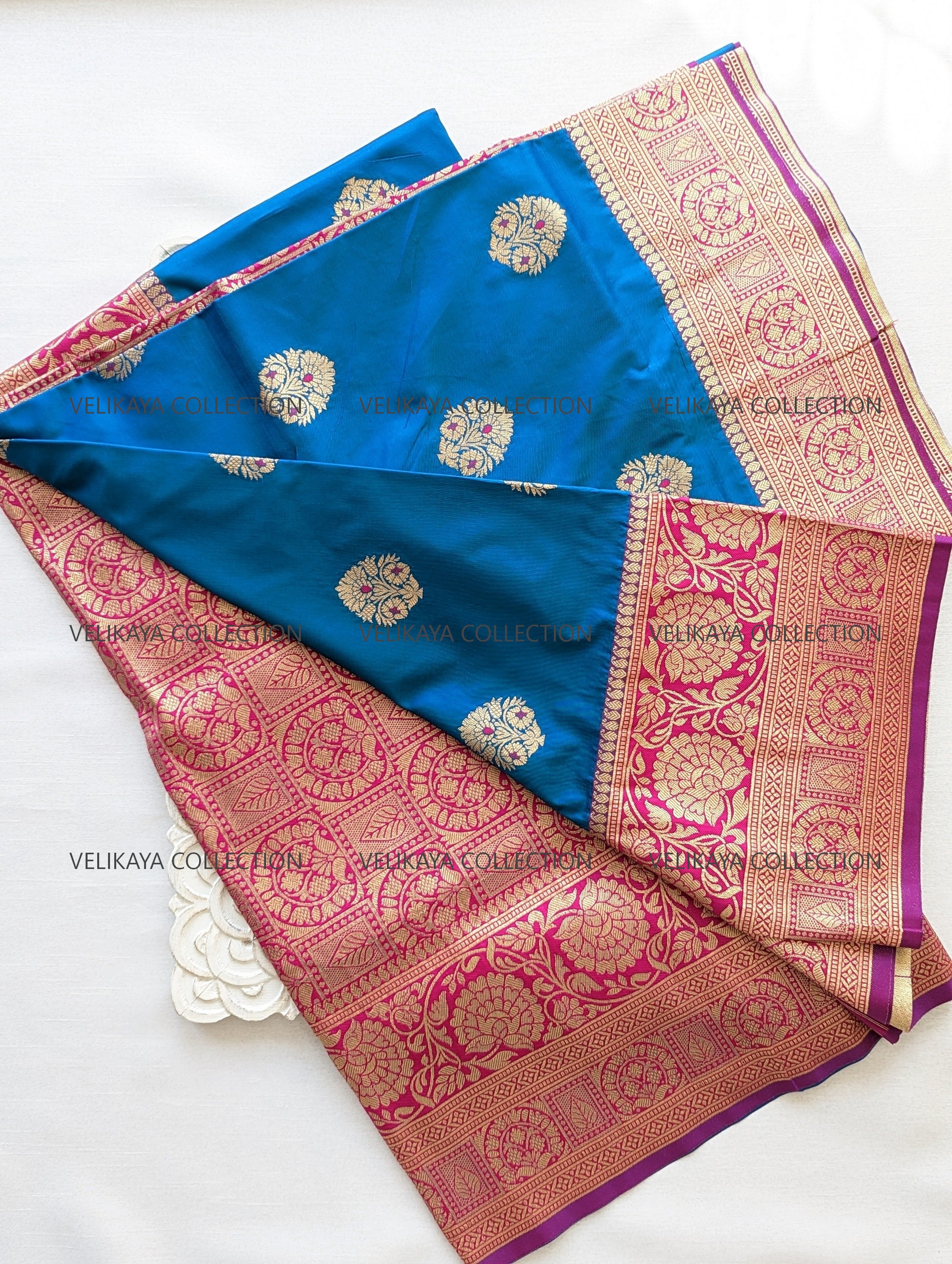 Blue Silk Saree with Gold Border and Blouse