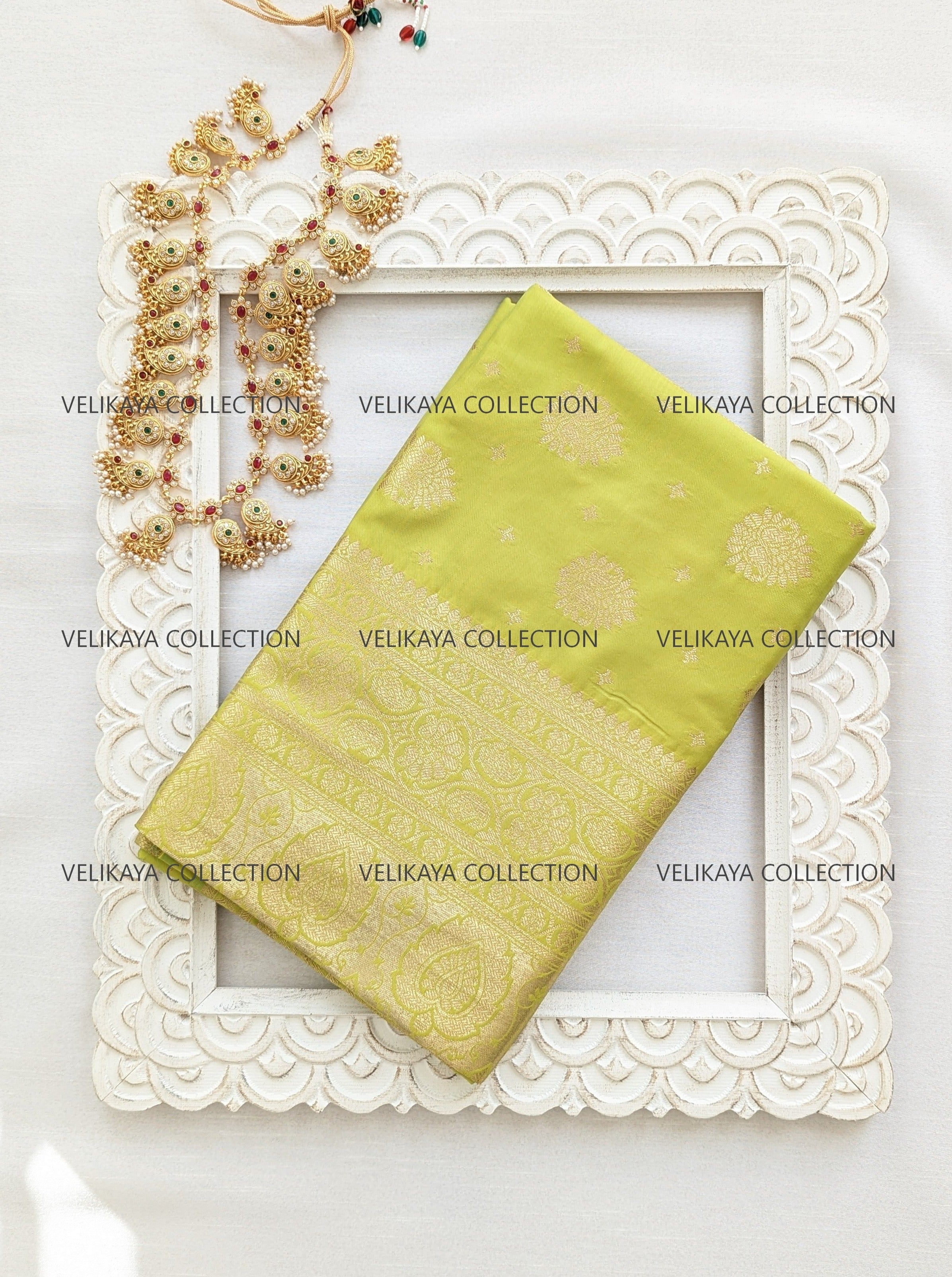 Green Silk Saree with Gold Border