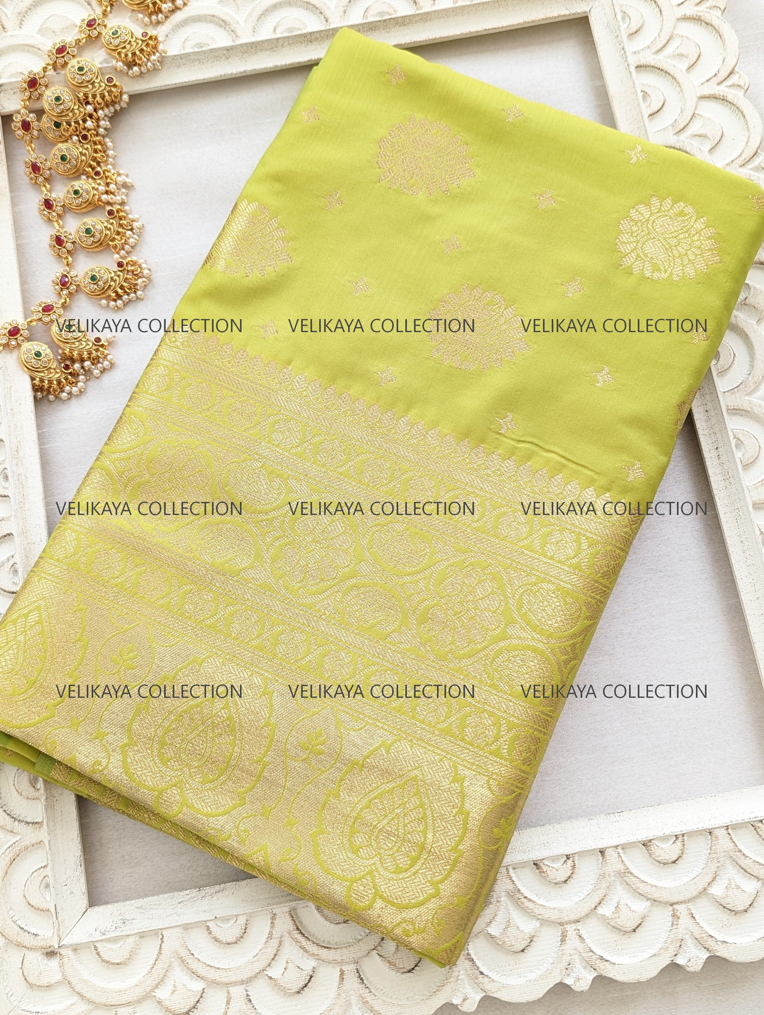 Green Silk Saree with Gold Border