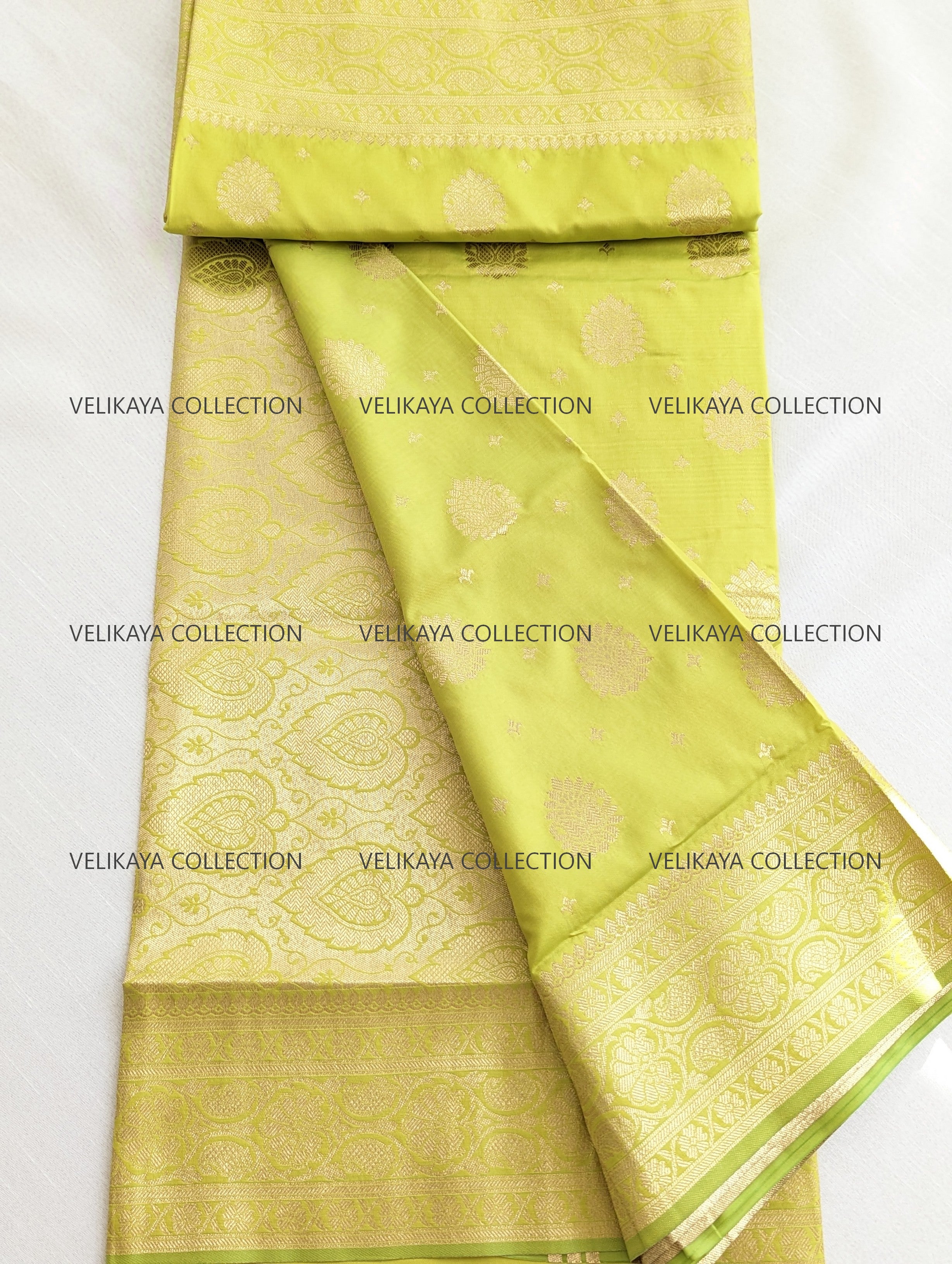 Green Silk Saree with Gold Border