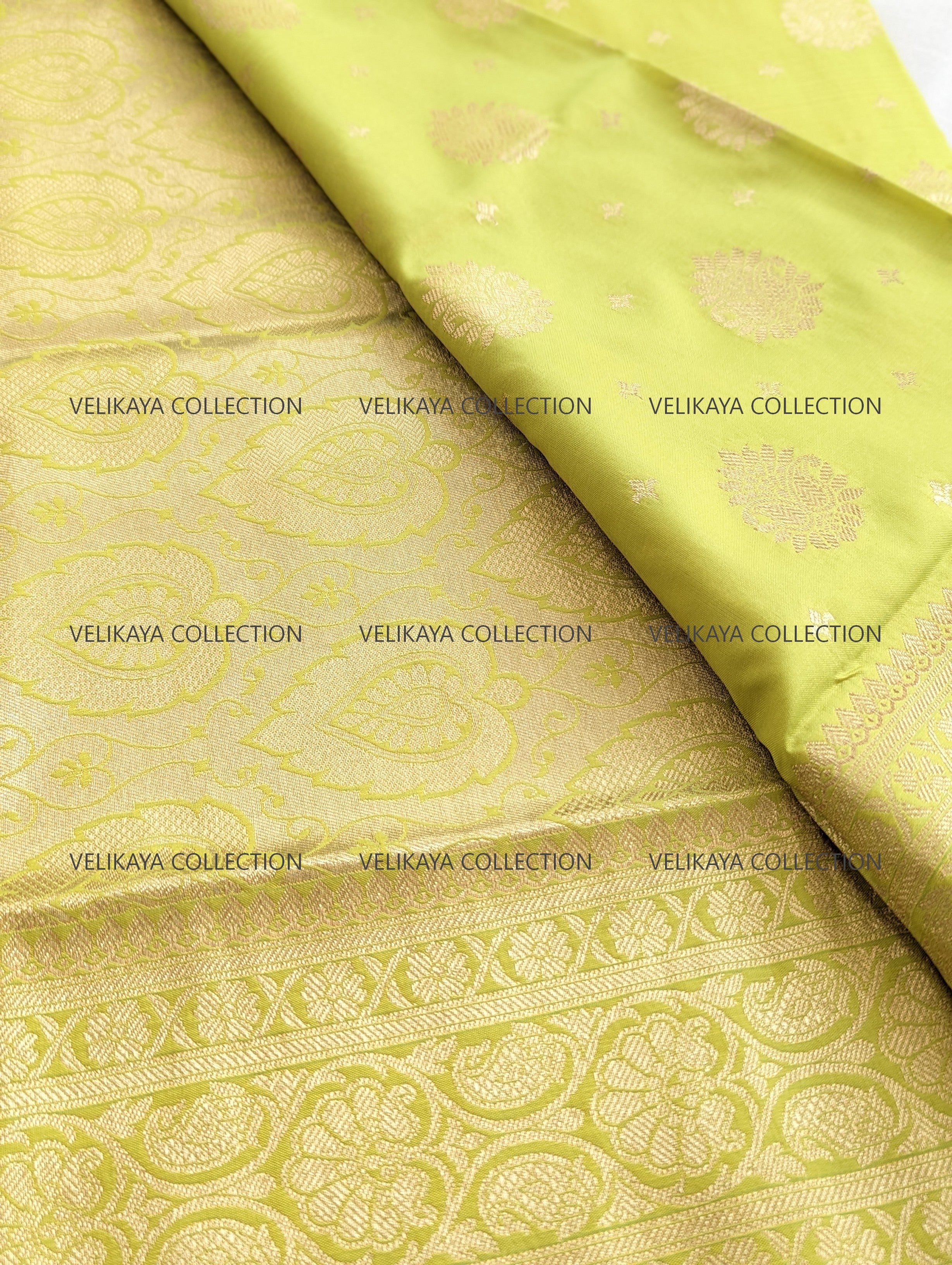 Green Silk Saree with Gold Border