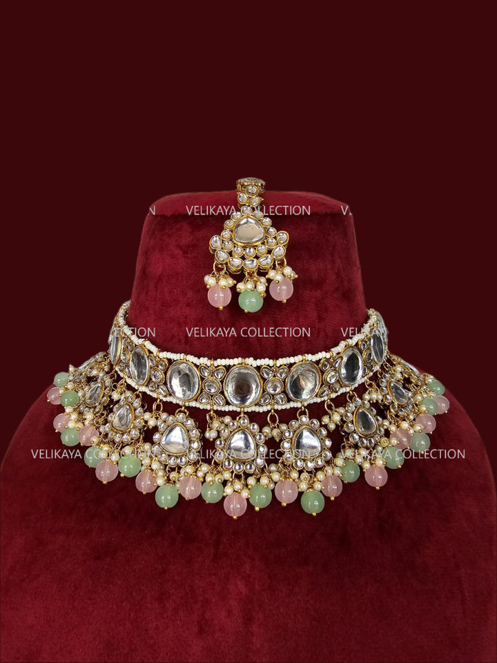 Kundan choker necklace with jhumkas and tikka. Gold plating. Mint beads. Indian wedding jewelry. Pakistani jewelry.