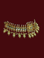 Load image into Gallery viewer, This is a gold plated handmade kundan choker necklace with matching stud earrings.
