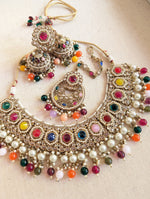 Load image into Gallery viewer, Gold necklace set with chandbali earrings and tikka. Polki choker necklace set. Indian wedding jewelry. Pakistani wedding jewelry. Bollywood necklace set. Punjabi jewelry set. Kundan necklace jhumka. Antique gold-plated necklace. Champagne stones.
