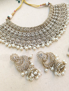 Antique Gold necklace set with chandbali earrings and tikka. Polki choker necklace set. Indian wedding jewelry. Pakistani wedding jewelry. Bollywood necklace set. Punjabi jewelry set. Kundan necklace jhumka. Antique gold-plated necklace. Champagne stones.