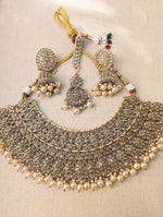 Load image into Gallery viewer, Gold necklace set with chandbali earrings and tikka. Polki choker necklace set. Indian wedding jewelry. Pakistani wedding jewelry. Bollywood necklace set. Punjabi jewelry set. Kundan necklace jhumka. Antique gold-plated necklace. Champagne stones.
