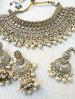 Load image into Gallery viewer, Gold necklace set with chandbali earrings and tikka. Polki choker necklace set. Indian wedding jewelry. Pakistani wedding jewelry. Bollywood necklace set. Punjabi jewelry set. Kundan necklace jhumka. Antique gold-plated necklace. Champagne stones.
