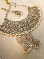 Load image into Gallery viewer, Gold necklace set with chandbali earrings and tikka. Polki choker necklace set. Indian wedding jewelry. Pakistani wedding jewelry. Bollywood necklace set. Punjabi jewelry set. Kundan necklace jhumka. Antique gold-plated necklace. Champagne stones.
