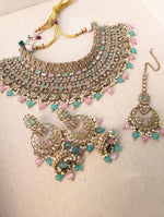 Load image into Gallery viewer, Antique Gold necklace set with chandbali earrings and tikka. Polki choker necklace set. Indian wedding jewelry. Pakistani wedding jewelry. Bollywood necklace set. Punjabi jewelry set. Kundan necklace jhumka. Antique gold-plated necklace. Champagne stones.
