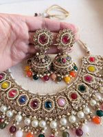 Load image into Gallery viewer, Gold necklace set with chandbali earrings and tikka. Polki choker necklace set. Indian wedding jewelry. Pakistani wedding jewelry. Bollywood necklace set. Punjabi jewelry set. Kundan necklace jhumka. Antique gold-plated necklace. Champagne stones.
