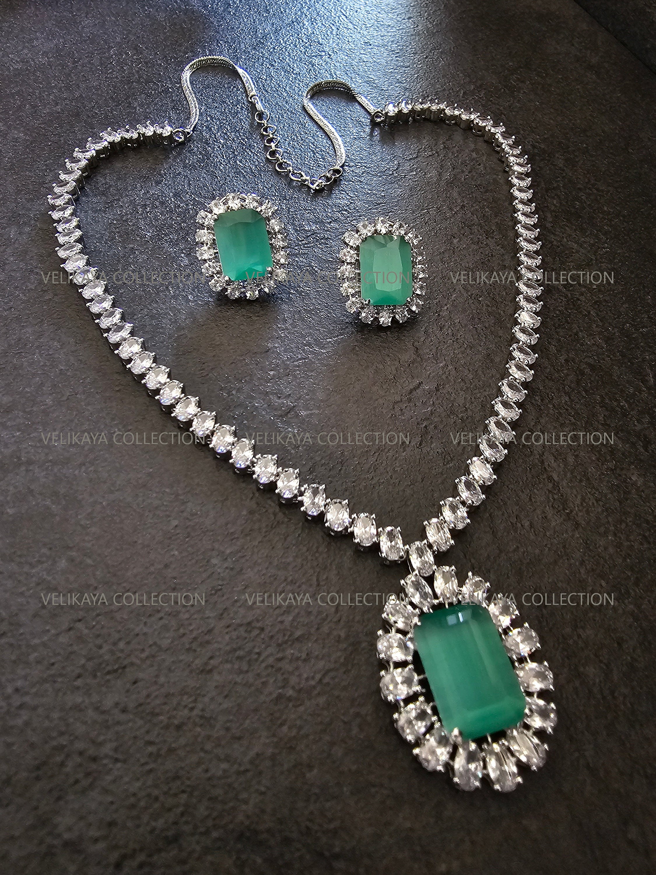 Inaya Blue Pendant Necklace & Earrings