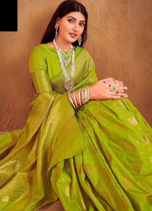 Green Silk Saree with Gold Border