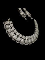 Load image into Gallery viewer, This is silver plated american diamond necklace with statement earrings for weddings and parties.
